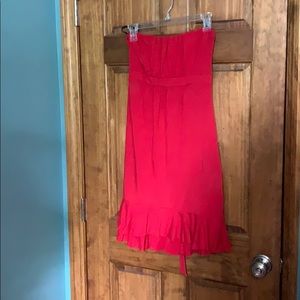 Red strapless dress.